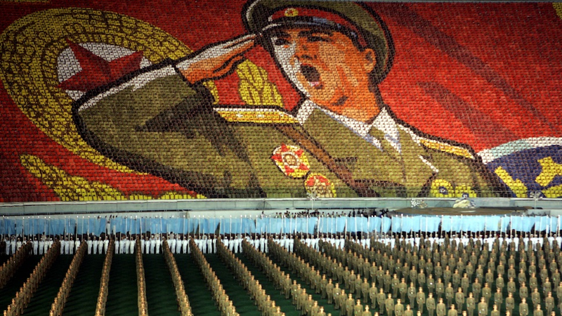Illustration for article titled The Amazing, Colorful Flip Card Propaganda Mosaics of North Korea